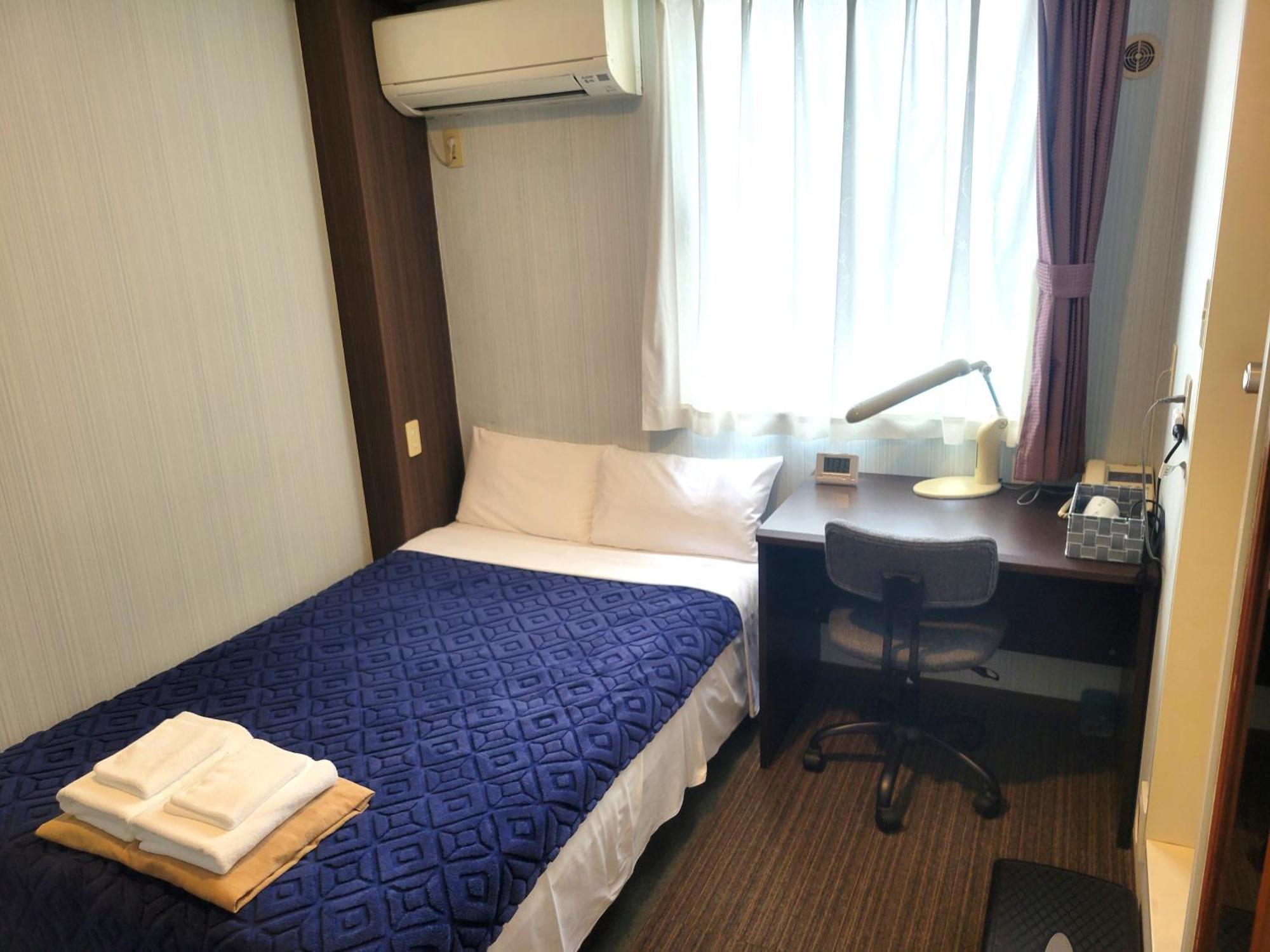 Saga City Hotel Room photo